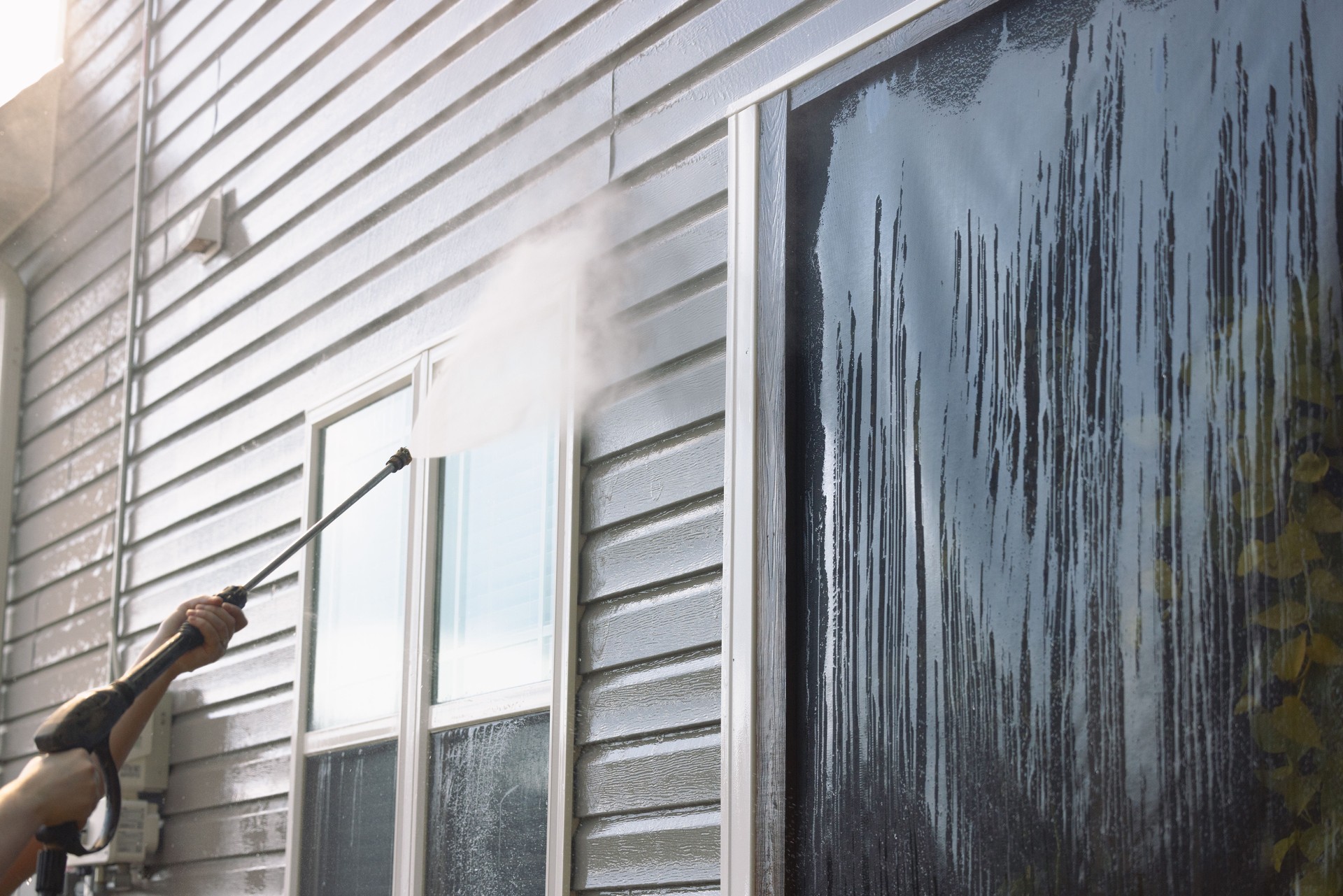 Pressure Washing Vinyl Siding - Patio Net - House